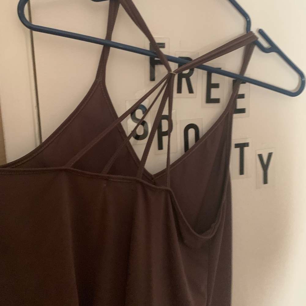 Cute Loose Tank Top w Back Detailing.